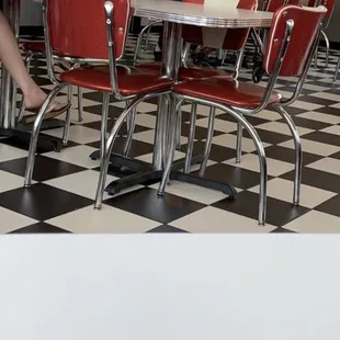 a woman sitting at a table