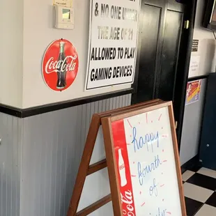 a sign in a restaurant