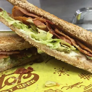 BLT on toasted wheat toast.