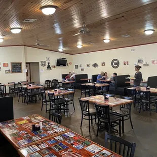 a restaurant with tables and chairs