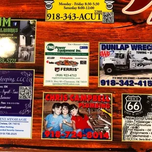 The quintessential small town diner tables with town businesses advertising!
