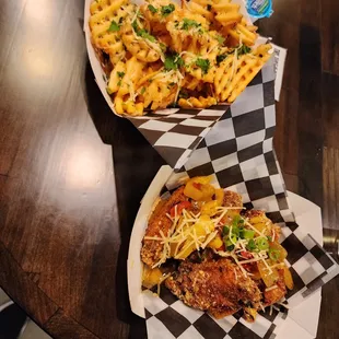 two baskets of food on a table
