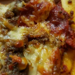 Look at the left edge, it's room temperature and you had to rip the slices from the pizza with two hands.