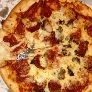 Worst pizza every then we call no refund that's just crazy terrible don't go to the buddy's on 90 villard