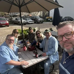 Enjoying a cold beer and a sunny afternoon.