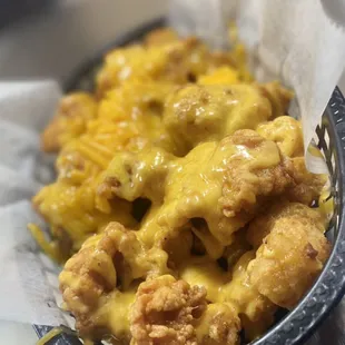 Cheesy Tots!! (Tater Tots with Melted Cheddar Cheese)