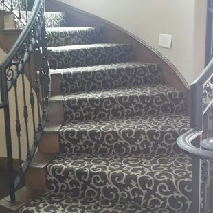 One of our new patterns of Shaw Flooring installed on a beautiful staircase!  This staircase turns into a true work of art wi...