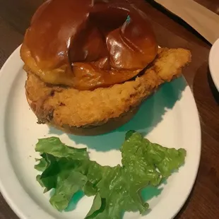 Pork tenderloin sandwich... needs more lettuce and mayo