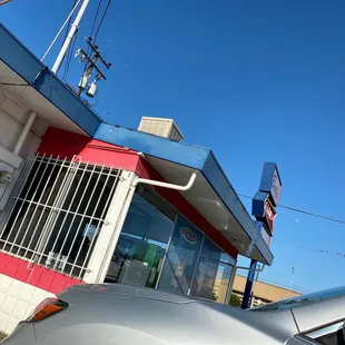 a car parked in front of a building