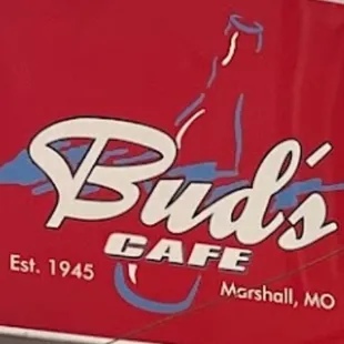 a sign for bud&apos;s cafe