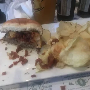 a sandwich and potato chips