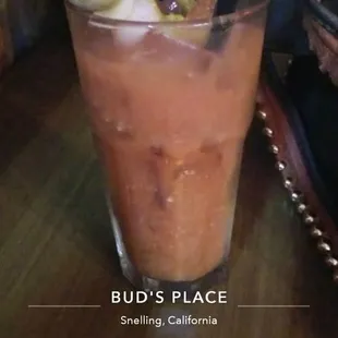 a bloody drink with olives