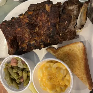 Half rack of ribs with green beans and Mac n cheese sides