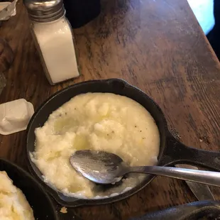 a bowl of grits and a pan of grits