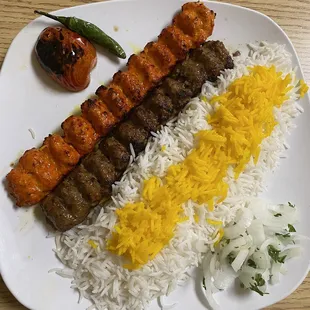 Beef and Chicken Kabobs with rice. Ask for the green spicy salsa!