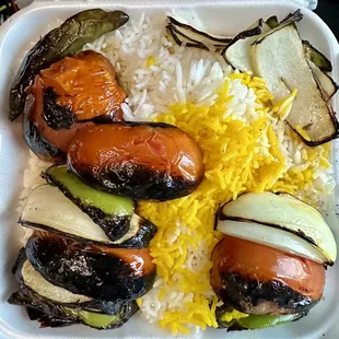 a meal in a styrofoam container