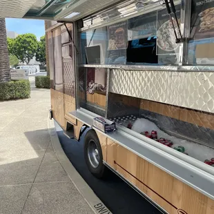 a food truck parked on the side of the road