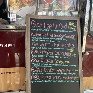 a menu on a food truck