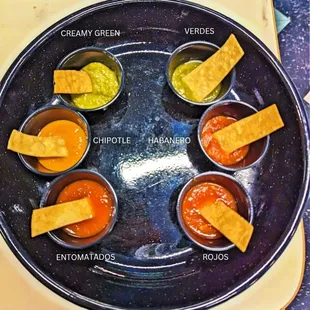 different sauces and dips on a plate