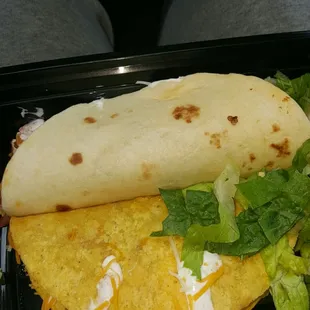 Went on a saturday afternoon. Got 2 tacos for 99 cents.  Came with your choice of meat and 3 toppings. Soft shell was the best