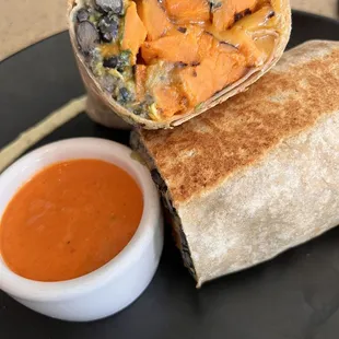 Breakfast Burrito with two cage free fried eggs.