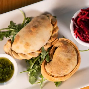 Vegan Empanadas Lunch! One sweet potato kale empanada and one Beyond &quot;beef&quot; empanada, served with a beet slaw and house chimichurri.