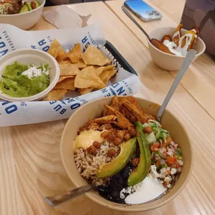 Buena Bowl w/Adobe chicken. Platanos. Chips &amp; Guac
