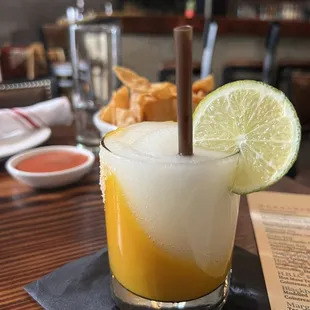 Beautiful and perfect frozen mango marg ($6.50 during HH Tues-Fri 4-6PM or $13 normal price)!