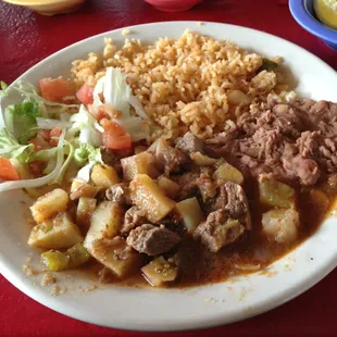 Carne guisada, rice and refried beans and don&apos;t forget the homemade flour tortillas !