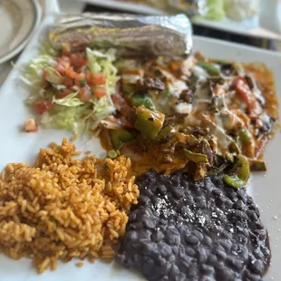 Puntas con nopales - beef with cactus, bell peppers and topped with some type of cheese