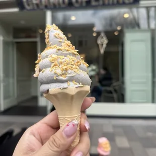 Black sesame with frosted corn flakes.   Light and nutty with a creamy finish.