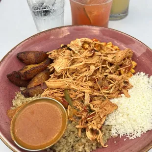 Bowl with Tinga Chicken, plantains, corn, quinoa and queso fresco