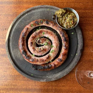 a plate of grilled sausages