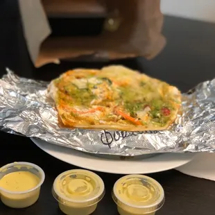 a plate of food and condiments