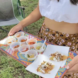 A sampler of Poblano Chicken, Al Pastor, Deshebrada, and Chicken Tinga.