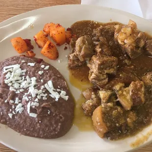 Carnitas, chicharron, re fried beans and potatoes w/chorizo and served with three hot flour tortillas. Very delicious!