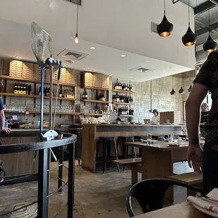a man standing in a restaurant
