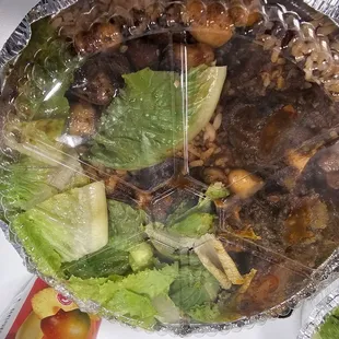 Oxtail with rice and peas.