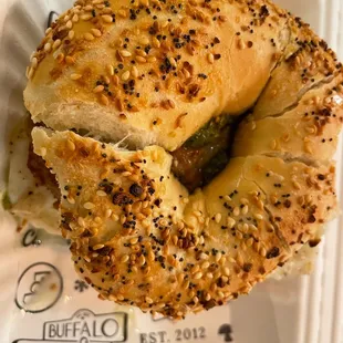 a bagel with a bite taken out of it