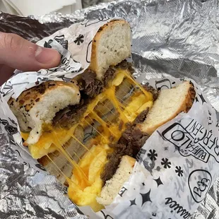 Toasted egg, cheese, steak on everything bagel