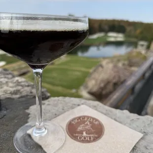 Espresso martini with a Par 3 golf view