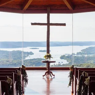 a view of a lake and a cross