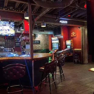 a view of the bar and seating area