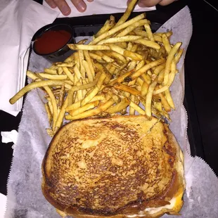 Grilled cheese with tomato and side of fries