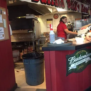 Not bad! The cooker in the back roasts the wings. I'd describe them as a mix of BBQ and Hot wing flavor. I'm a fan.