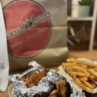 Traditional bone-in wings in original hot and lemon pepper with fries.