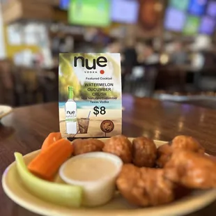 a plate of food with nue