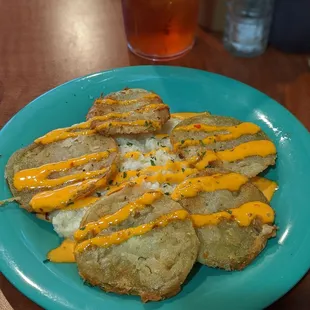 Fried green tomatoes with jalapeño cheese grits.