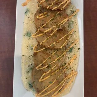 These were so good!!! Fried green tomatoes on a bed of jalapeño cheese grits!!