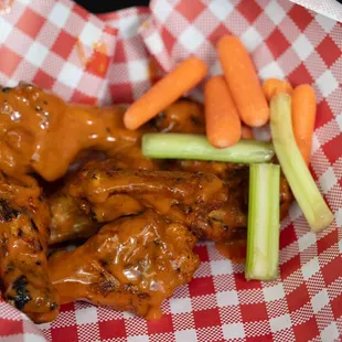 Mild wings grilled off our famous fire pit